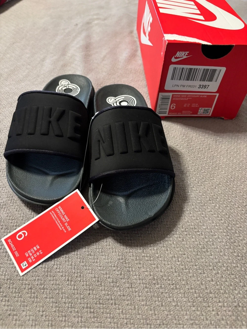 Nike Black Kids Slide Sandals with Embossed Logo